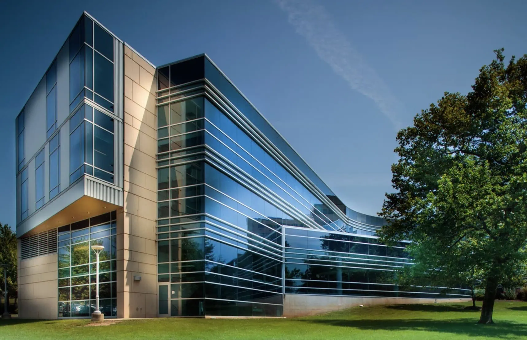 Modern blue glass building at Geisinger – University of Pittsburgh